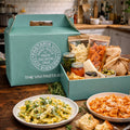 Vivi Pasta subscription box with pasta dishes and ingredients on a wooden table