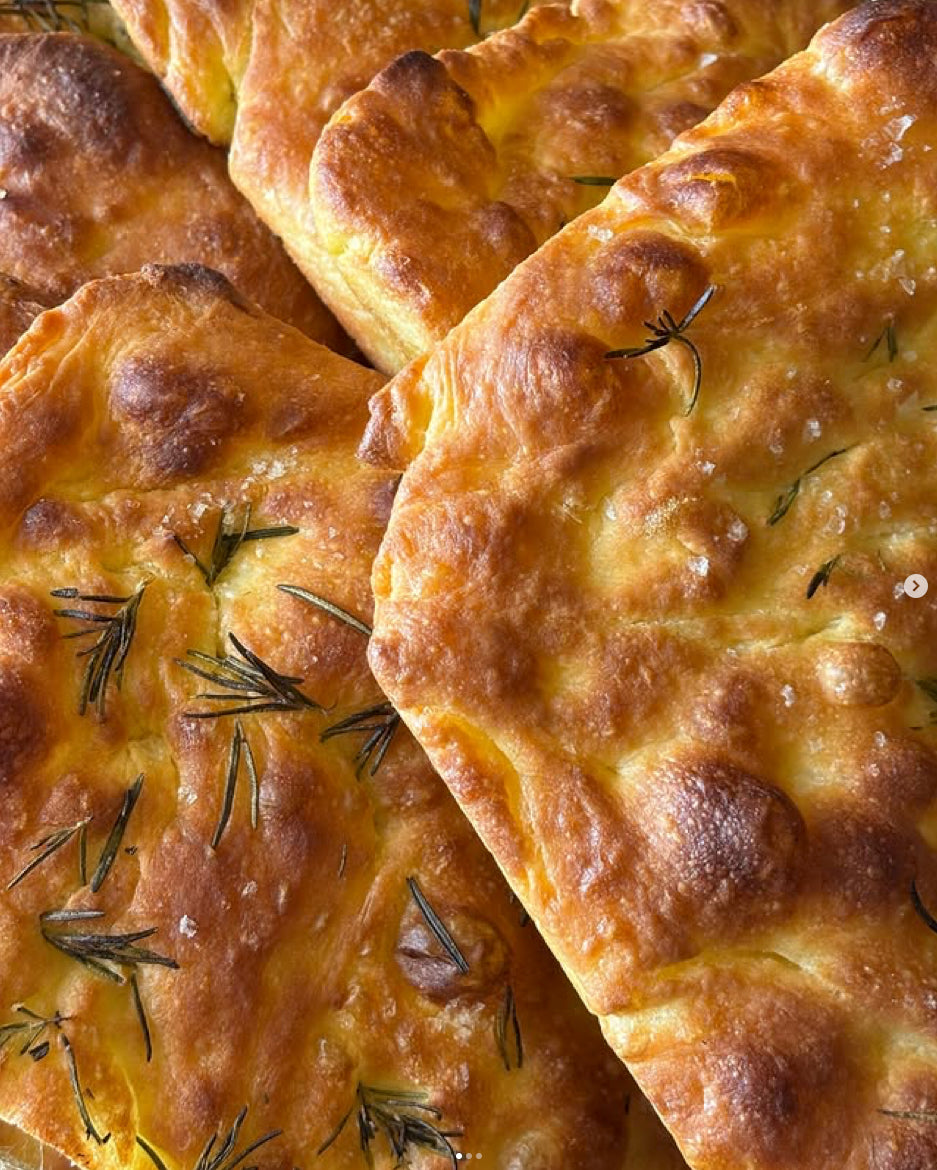 Golden rosemary focaccia with sea salt, baked in house at Pastaria Vivi
